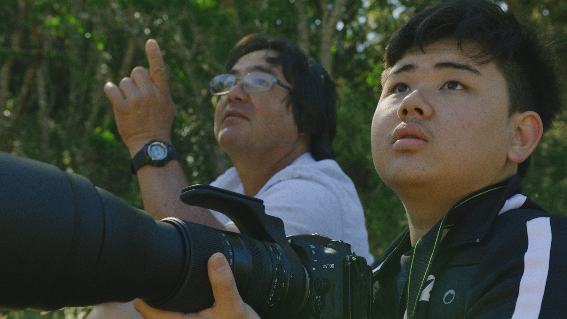Jared_with his father birding.jpg